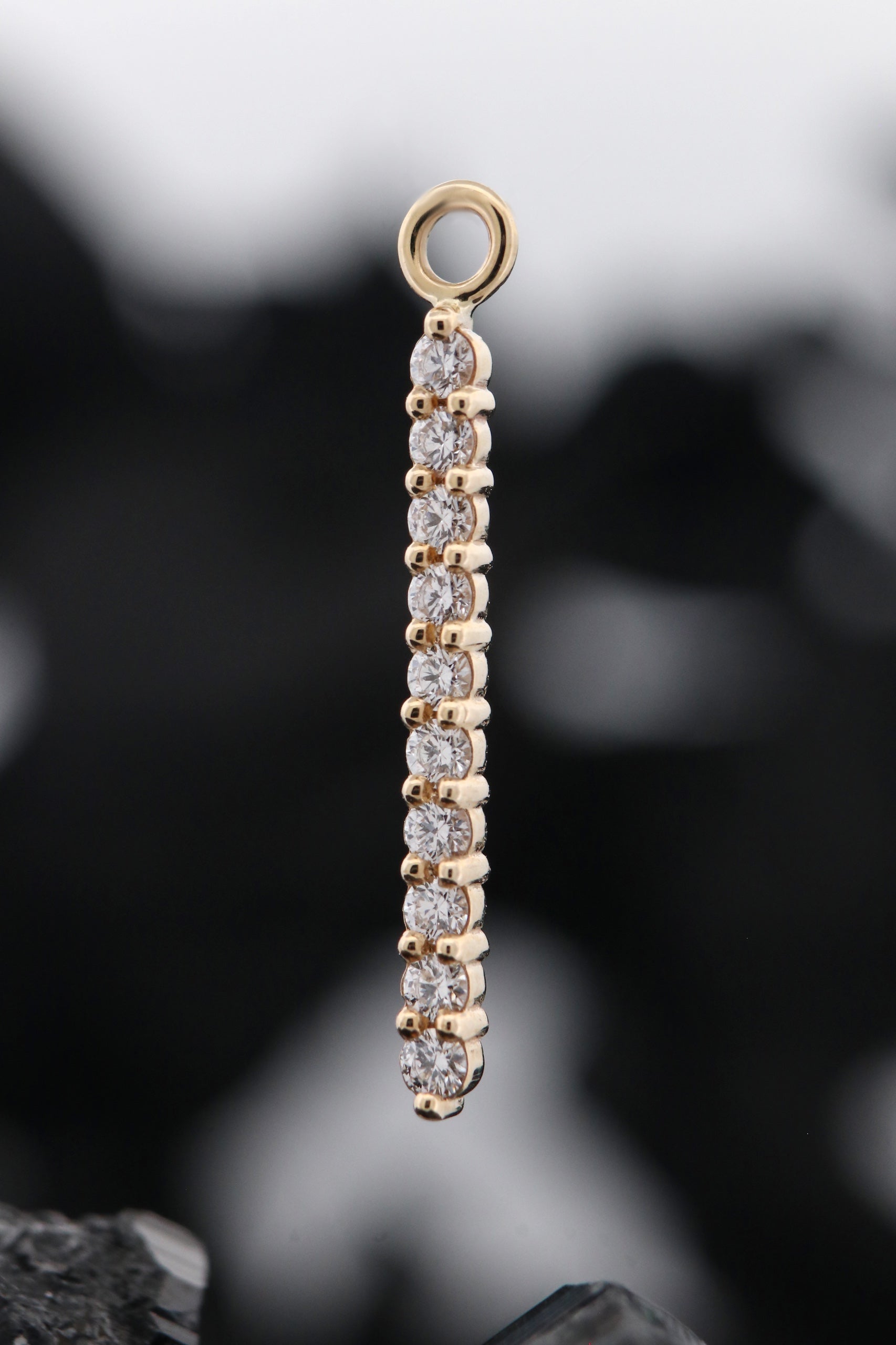 Linear 10 Prong Charm, photo 1 of 2